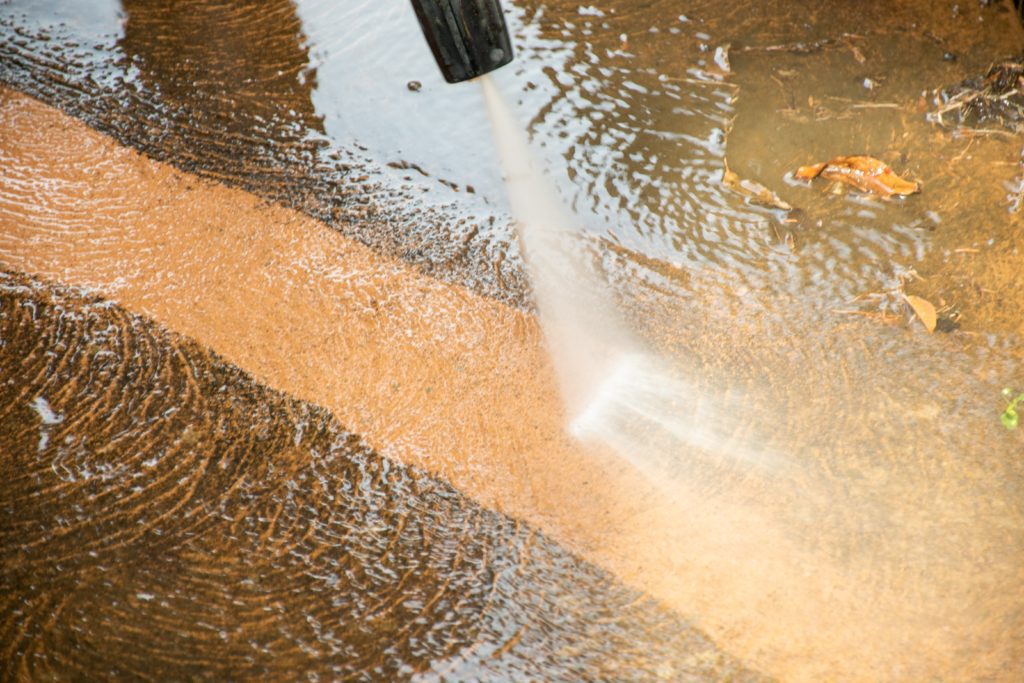 commercial pressure washing on a driveway