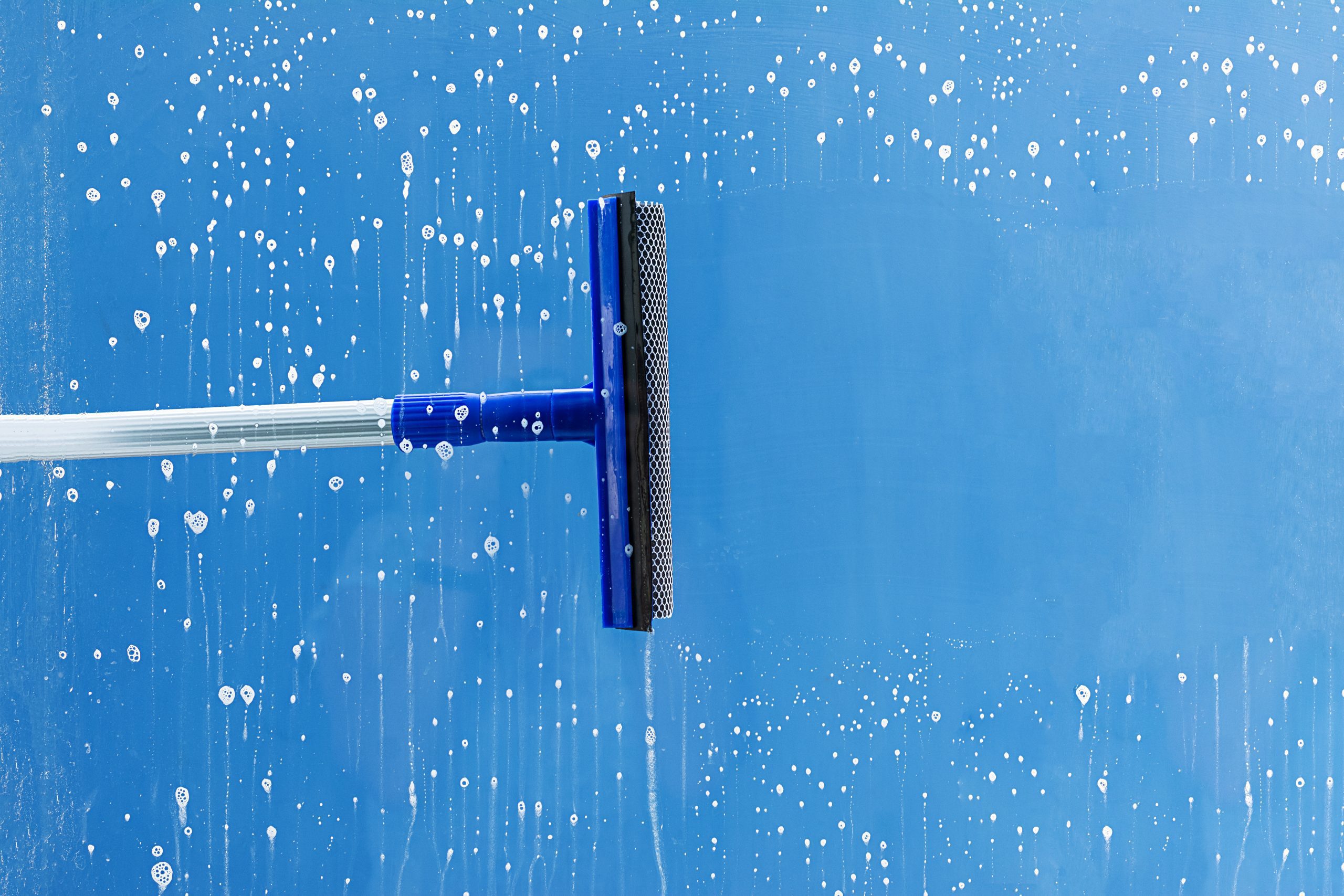 Squeegee window cleaning